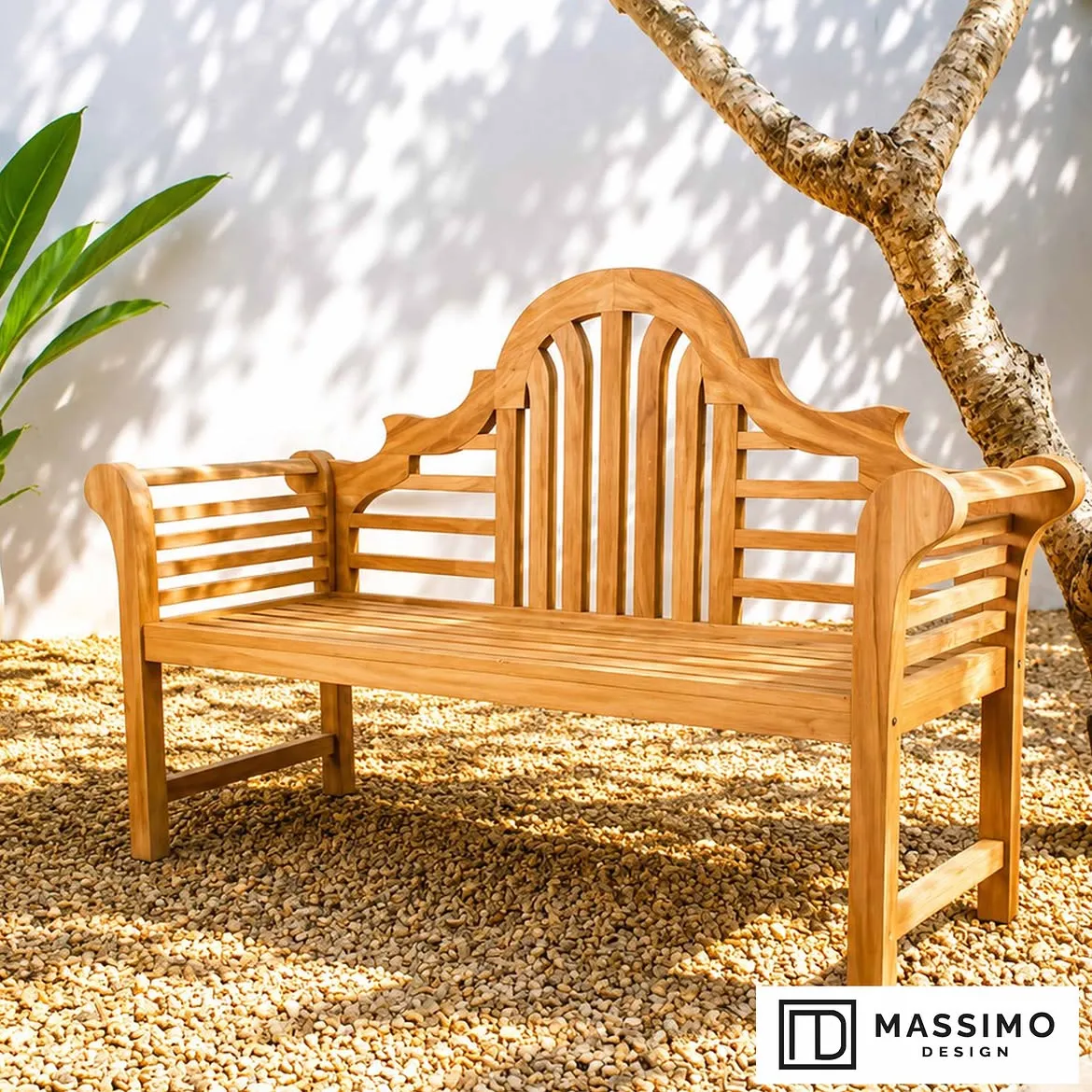 Serene garden bench in sunlight